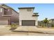 Charming two-story home with a two car garage, modern fence, and easy landscaping at 6211 Stable View St, Castle Pines, CO 80108