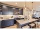 Contemporary kitchen with stainless steel appliances, sleek cabinetry, and ample counter space at 6211 Stable View St, Castle Pines, CO 80108