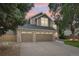 Charming two-story home with a three-car garage and well-maintained landscaping at 17051 Wellington Dr, Parker, CO 80134