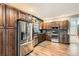 Well-equipped kitchen with stainless steel appliances, modern cabinetry, and stylish backsplash at 1793 E 164Th Pl, Brighton, CO 80602