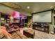 Basement featuring a media space, wet bar, and carpeted floors at 1793 E 164Th Pl, Thornton, CO 80602