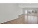 Bright living room with large windows and ceramic tile flooring throughout at 5688 Alcott St, Denver, CO 80221