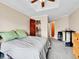 Comfortable bedroom features a ceiling fan, with a closet for storage, and carpeted floors at 2074 Oakcrest Cir, Castle Rock, CO 80104