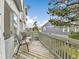 Outdoor deck space with seating, offering a view of the surrounding neighborhood at 2074 Oakcrest Cir, Castle Rock, CO 80104