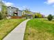 Property exterior showcasing a gazebo and spacious grassy lawn at 2074 Oakcrest Cir, Castle Rock, CO 80104