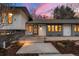 Charming single-Gathering home with modern design, well-lit entryway, and manicured landscaping at 4071 S Dahlia St, Cherry Hills Village, CO 80113