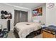 Bedroom featuring wall art, a window with curtains, carpet, and a comfortable bed at 850 Grove St, Denver, CO 80204