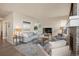 Bright living room featuring lots of natural light, and a cozy seating arrangement at 6780 Canosa St, Denver, CO 80221