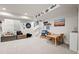 Spacious basement, featuring new carpet and decorated with toys and art at 3418 New Haven Cir, Castle Rock, CO 80109