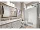 Cozy bathroom with a combined tub and shower, updated vanity, and neutral finishes at 3418 New Haven Cir, Castle Rock, CO 80109
