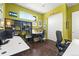 Bright home office featuring hardwood floors, ample storage, and a dedicated workspace at 3418 New Haven Cir, Castle Rock, CO 80109