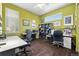 Inviting home office with dual workstations, hardwood floors, and plenty of natural light at 3418 New Haven Cir, Castle Rock, CO 80109