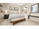 The main bedroom features soft lighting, a tray ceiling, a bench seat and connects to the main bathroom at 3418 New Haven Cir, Castle Rock, CO 80109