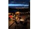 Outdoor patio with seating around a gas firepit, perfect for evening relaxation at 42013 Big Horn Cir, Elizabeth, CO 80107
