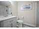 Clean bathroom with a marble vanity, walk-in shower, and updated fixtures at 42013 Big Horn Cir, Elizabeth, CO 80107