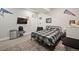 Cozy bedroom with black metal bed frame and sports decor at 42013 Big Horn Cir, Elizabeth, CO 80107