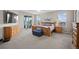 Spacious main bedroom featuring a balcony, large windows, and ample natural light at 42013 Big Horn Cir, Elizabeth, CO 80107