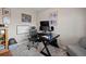 Functional office space with built-in desk, comfortable chair, and neutral carpet at 42013 Big Horn Cir, Elizabeth, CO 80107