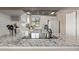 Modern kitchen featuring sleek countertops, stainless steel appliances, and ample cabinet space at 4548 E Kentucky Cir, Denver, CO 80246