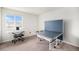 Spacious game room with ping pong table, keyboard and a bright window, perfect for recreation at 12405 E 101St Dr, Commerce City, CO 80022
