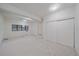 Bedroom featuring neutral walls and carpet, a window, and a large closet at 235 S Monaco Pkwy, Denver, CO 80224