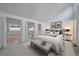 Bright bedroom with a vaulted ceiling featuring a sitting area and mezzanine access, offering space and style at 235 S Monaco Pkwy, Denver, CO 80224