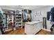 Organized walk-in closet featuring custom shelving and storage solutions at 3002 S Oak Way, Lakewood, CO 80227