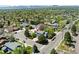 Charming home nestled in a quiet neighborhood with lush trees and mountain views at 411 S Cody Ct, Lakewood, CO 80226