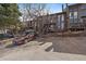 Exterior view of condos with parking and partial tree coverage at 350 Arapahoe Ave # 17, Boulder, CO 80302