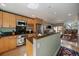 Bright kitchen featuring stainless steel appliances, granite countertops, and hardwood floors at 350 Arapahoe Ave # 17, Boulder, CO 80302