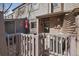 Outdoor patio area with comfortable seating and a decorative umbrella at 350 Arapahoe Ave # 17, Boulder, CO 80302