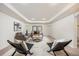 Large basement living space features modern furniture and décor at 18899 E Whitaker Cir, Aurora, CO 80015