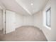 Finished basement space with ample closet and storage space, as well as a window for natural light at 18899 E Whitaker Cir, Aurora, CO 80015