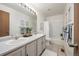 Bathroom with dual sinks, shower and lots of counter space at 18899 E Whitaker Cir, Aurora, CO 80015