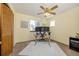 Spacious office space includes built-ins and natural light at 18899 E Whitaker Cir, Aurora, CO 80015