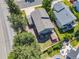 Aerial view of the home's backyard with a patio, greenery, and privacy fence at 18899 E Whitaker Cir, Aurora, CO 80015