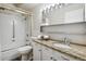 Clean bathroom with granite countertop and updated vanity at 605 S Alton Way # 9C, Denver, CO 80247