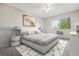 Serene bedroom with neutral decor and plenty of space for relaxation at 605 S Alton Way # 9C, Denver, CO 80247
