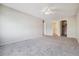 Primary bedroom with private bathroom access and closet at 605 S Alton Way # 9C, Denver, CO 80247