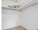 Large closet with double hanging rods and upper shelving at 605 S Alton Way # 9C, Denver, CO 80247