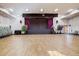 Large community room with stage and seating at 605 S Alton Way # 9C, Denver, CO 80247