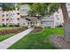 Building exterior showcasing landscaping and entrance at 605 S Alton Way # 9C, Denver, CO 80247