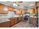 Modern kitchen with stainless steel appliances and granite countertops at 605 S Alton Way # 9C, Denver, CO 80247