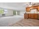Open living and dining area with access to a balcony at 605 S Alton Way # 9C, Denver, CO 80247