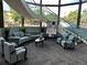 Lobby with seating area, curved staircase, and large windows at 605 S Alton Way # 9C, Denver, CO 80247