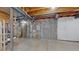 Unfinished basement with open ceiling and visible utilities at 15800 E 121St Ave # L1, Brighton, CO 80603