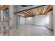 Unfinished basement featuring concrete floors, support beams and insulated walls at 15800 E 121St Ave # L1, Brighton, CO 80603