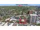 Aerial shot shows proximity to Cherry Creek North and showcases the building's location within a lively urban setting at 200 N Pearl St # 106, Denver, CO 80203