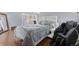 The primary bedroom showcases a massage chair for ultimate comfort and convenience at 200 N Pearl St # 106, Denver, CO 80203