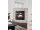 Cozy corner fireplace with a modern design at 16091 E Geddes Dr # 74, Aurora, CO 80016